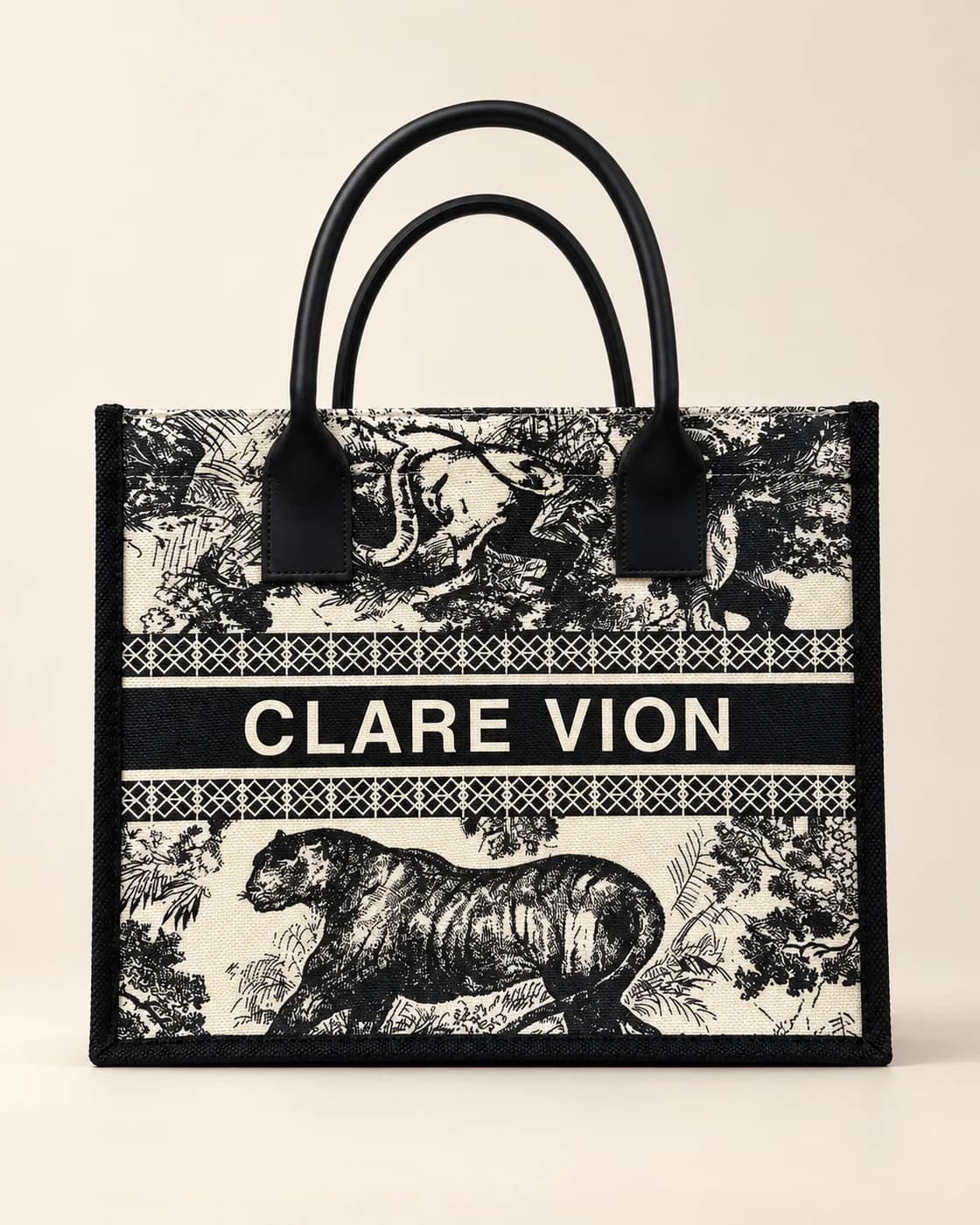 Túi canvas in tràn họa tiết muông thú đen trắng, quai da đen, chữ Clare Vion