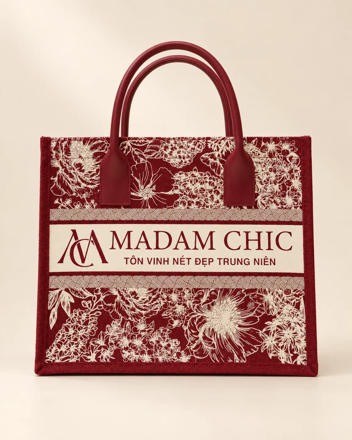 Túi canvas đỏ đô in hoa văn trắng quai da đỏ có dải logo Madam Chic