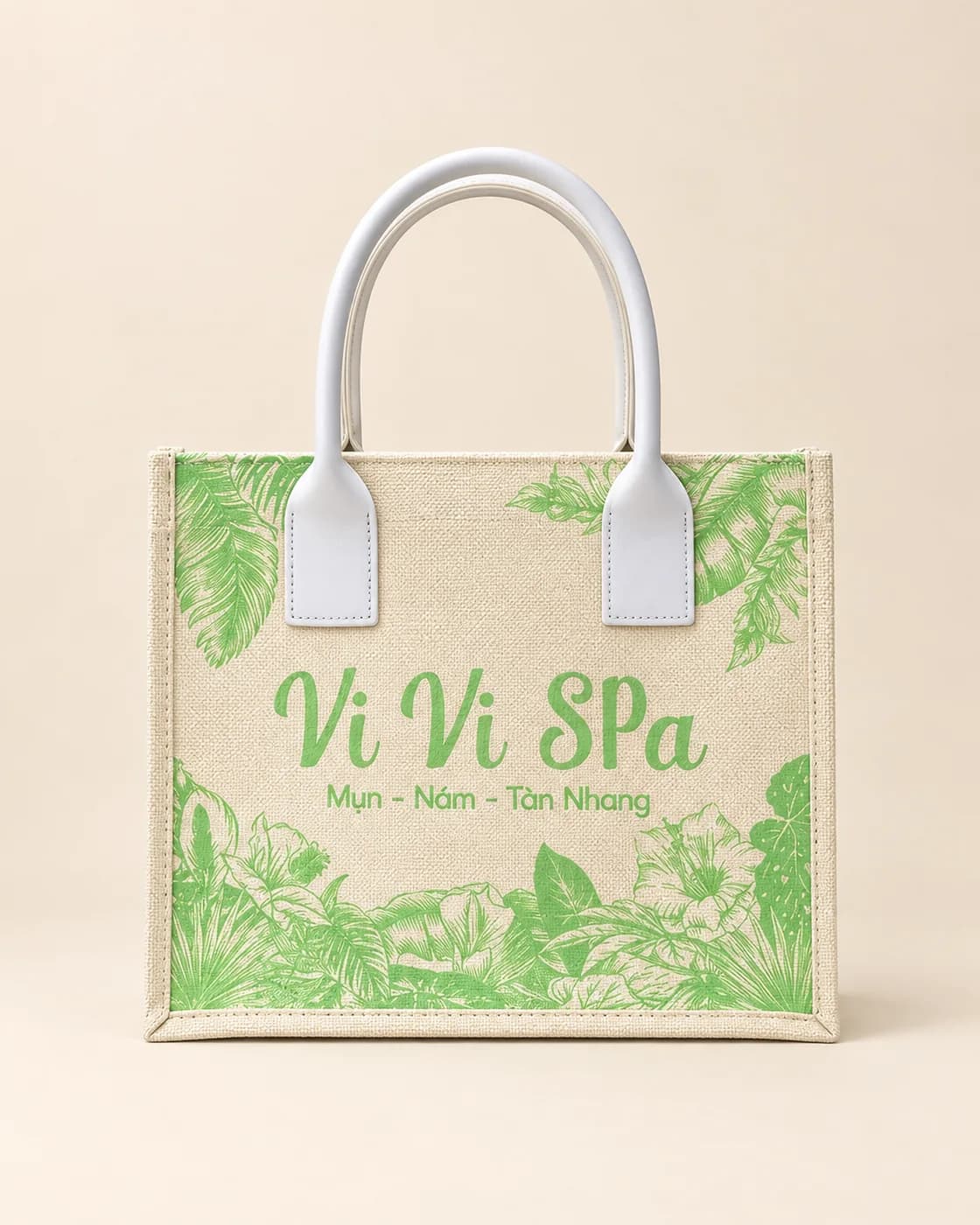 Túi canvas in họa tiết lá xanh quai da trắng, chữ Vi Vi Spa